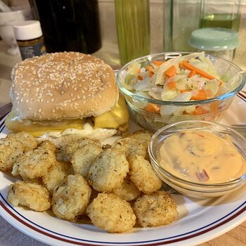 Fish Sandwich, Crispy Crowns, And Steamed Cabbage And Carrots