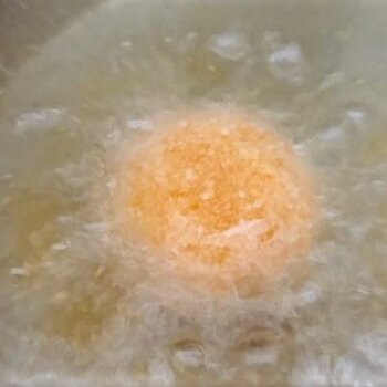 Deep-frying breaded egg yolk.jpg