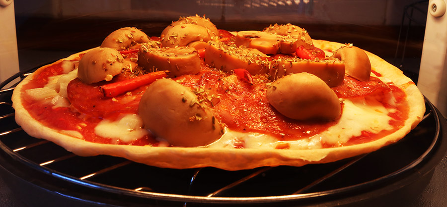 Pepperoni, mushroom and chili pizza.
