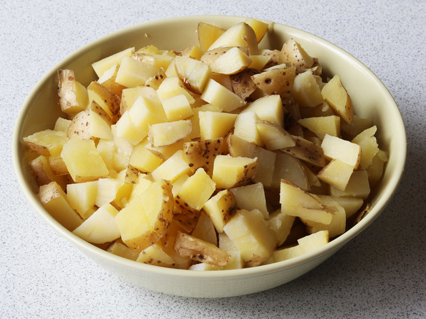 Potatoes, scrubbed, boiled and cubed.
