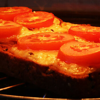 Cheese onion and tomato on toast.