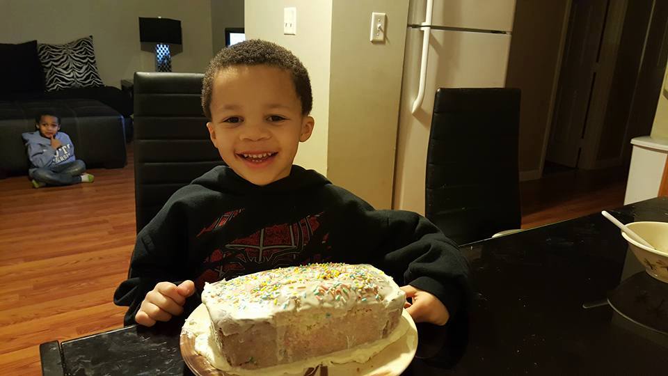 Jayden with birthday cake..jpg