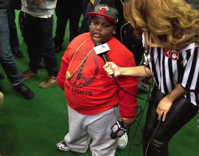 Lil Terio being interviewed by reporter..jpg