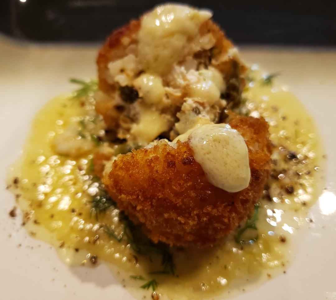Salmon, capers, and asparagus stuffed arancini plated cut view.jpg