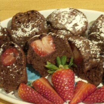 Chocolate muffin stuffed with strawberries