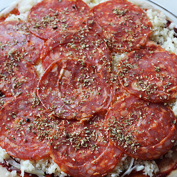 5. Sliced pepperoni and dried oregano.