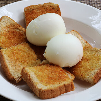 Soft boiled eggs on toast