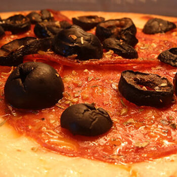 Pepperoni and black olives pizza