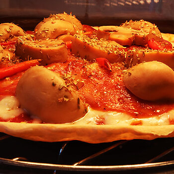 Pepperoni, mushroom and chili pizza.