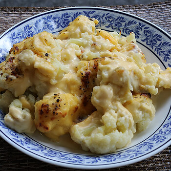 Cauliflower cheese served