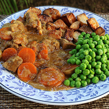 With roast potatoes (beef dripping) and peas.