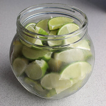 3. Bottling the lime wedges