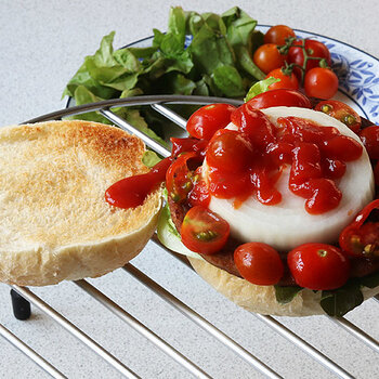 Raw onion, cherry tomatoes and ketchup.