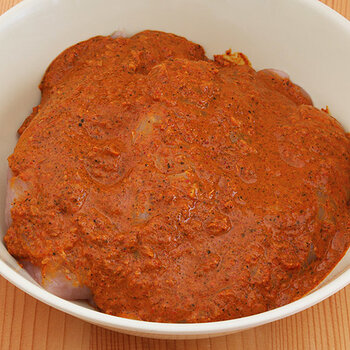 Chicken and marinade.