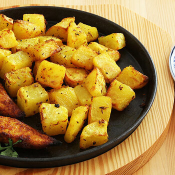 Spicy baked chicken with masala potatoes.
