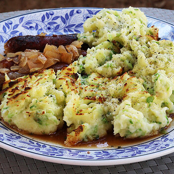 With sausages and a little onion gravy.