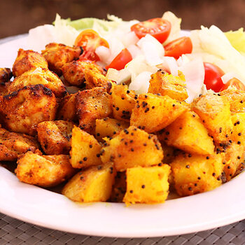 Chicken tikka with Bombay potatoes.