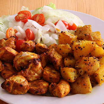 Chicken tikka with Bombay potatoes.