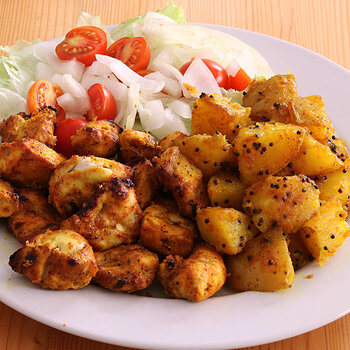 Chicken tikka with Bombay potatoes.