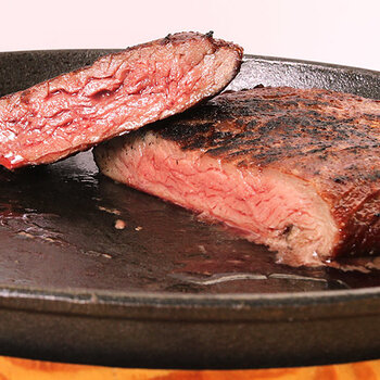 Medium-rare fillet beef steak.