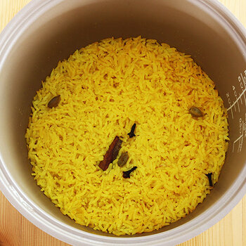 Cooking yellow rice.