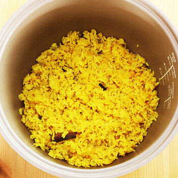 Cooking yellow rice.