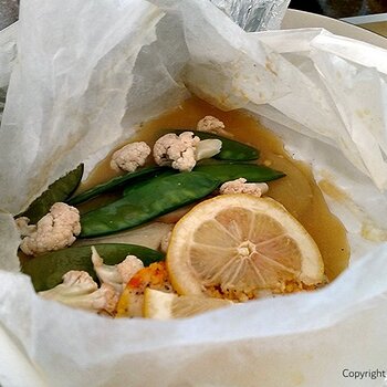 Saffron Lemon Garlic Cod en Papillote on plate