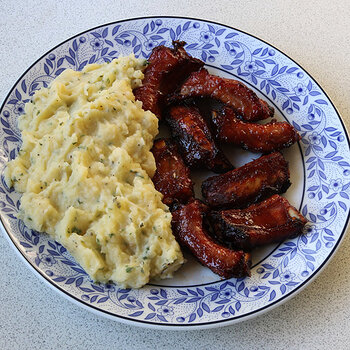 With parsley mashed potatoes and onions.