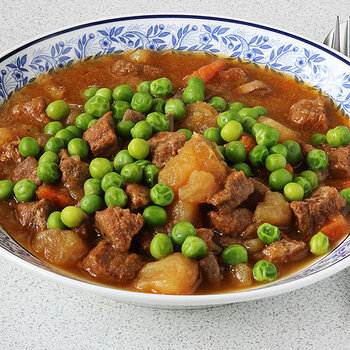 Stew with peas (reflected).
