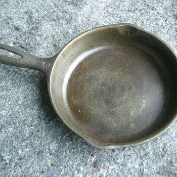 Old cast iron fry pan