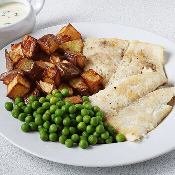 Halibut with roast potatoes and peas.