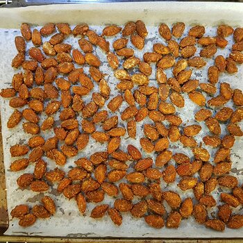 Roasted almonds cooling after being coated