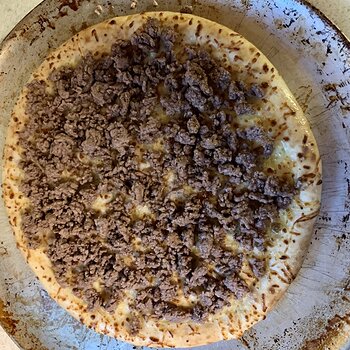 Crust topped with ground beef