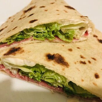 Piadina stuffed with Gorgonzola, salame and salad.jpeg