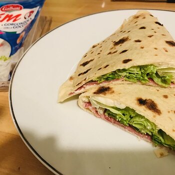 Piadina stuffed with Gorgonzola, salame and salad.jpeg