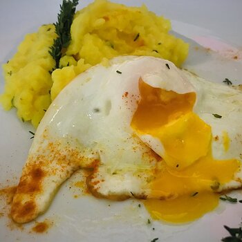 Turmeric-flavored mashed potatoes and fried egg.jpg