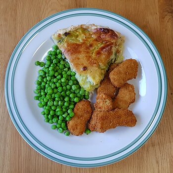 Leek and potato tart with nuggets and peas