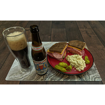 Cold Cuts Sandwich on Dark Rye Bread with Potato Salad and Doppel Bock Bier