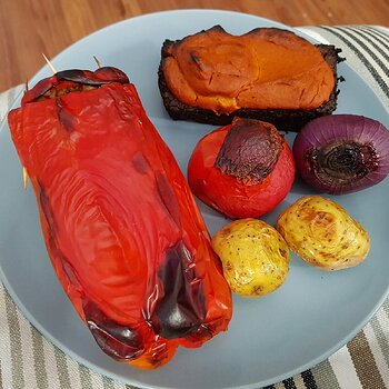 Tempeh loaf, roasted stuffed red pepper & veg