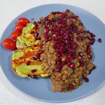 Smashed avo on Sourdough toast with Rummaniyeh and Shatta