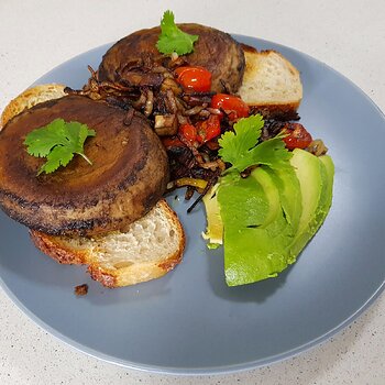 Mushroom steaks on toasted sourdough with avocado