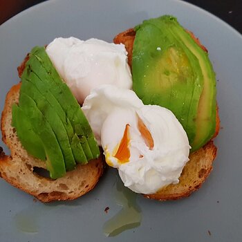 Smashed Avo on sourdough with poached eggs