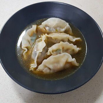 Served in a mushroom miso broth