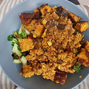 Spicy Aubergine Rice with vegan burger and bok choy