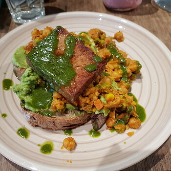 Smashed chickpea & avocado on sourdough with a tofu steak