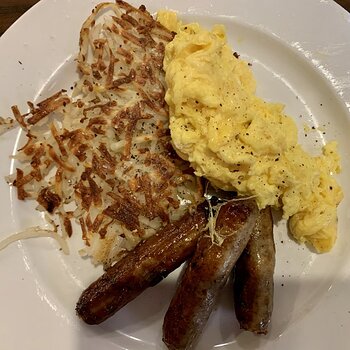 Scrambled Eggs, Hash Browns, And Sausage