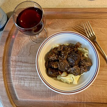 Beef Burgundy Over Buttered Noodles