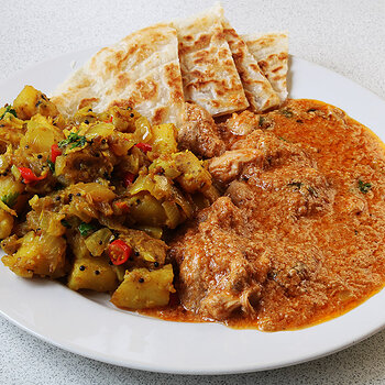 With hot and sour potatoes and roti s.jpg