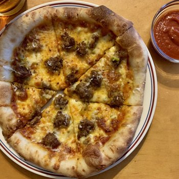Sausage And Hot Pepper Pizza