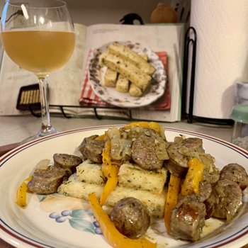 Sausage, Peppers, And Onions Over Broiled Polenta